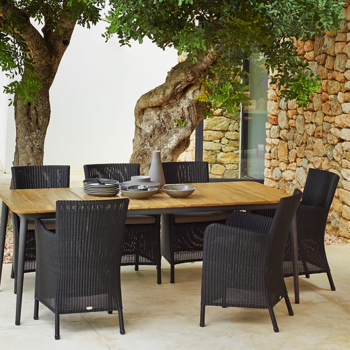 Tavolo da pranzo Core in teak 274x100x74 cm, Cavalletto grigio lava Cane-line