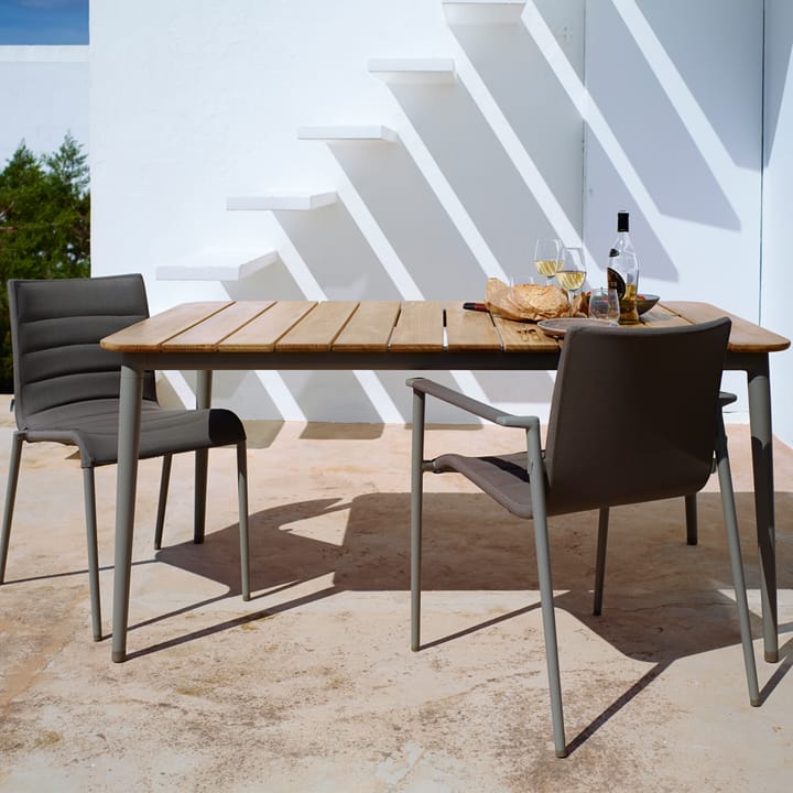 Tavolo da pranzo Core in teak 274x100x74 cm, Cavalletto grigio lava Cane-line