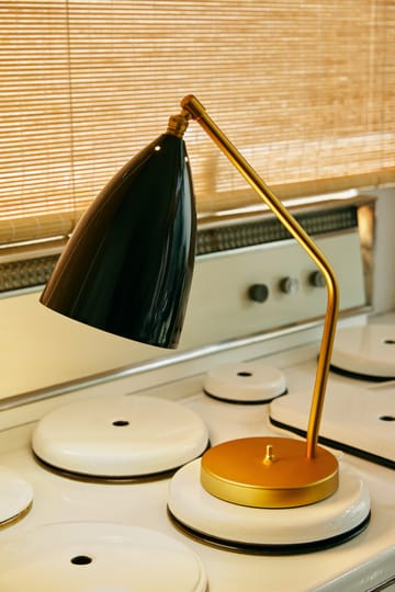 Lampada da tavolo Gräshoppa lucida - Black-brass - GUBI